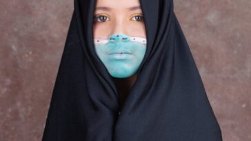 woman in black hijab and abaya